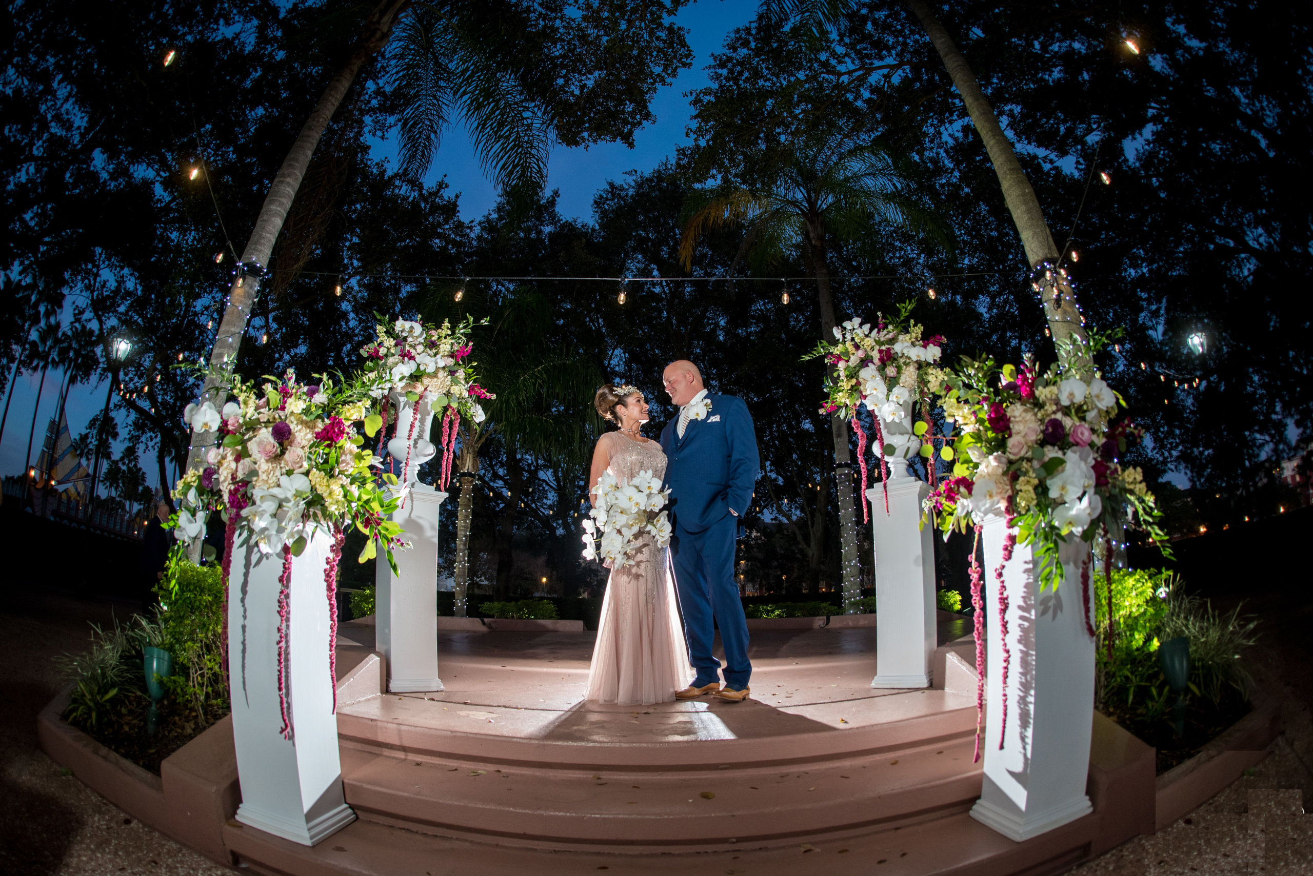 Wedding Couple After Ceremony at Crescent Terrace at the Walt Disney World Swan Resort