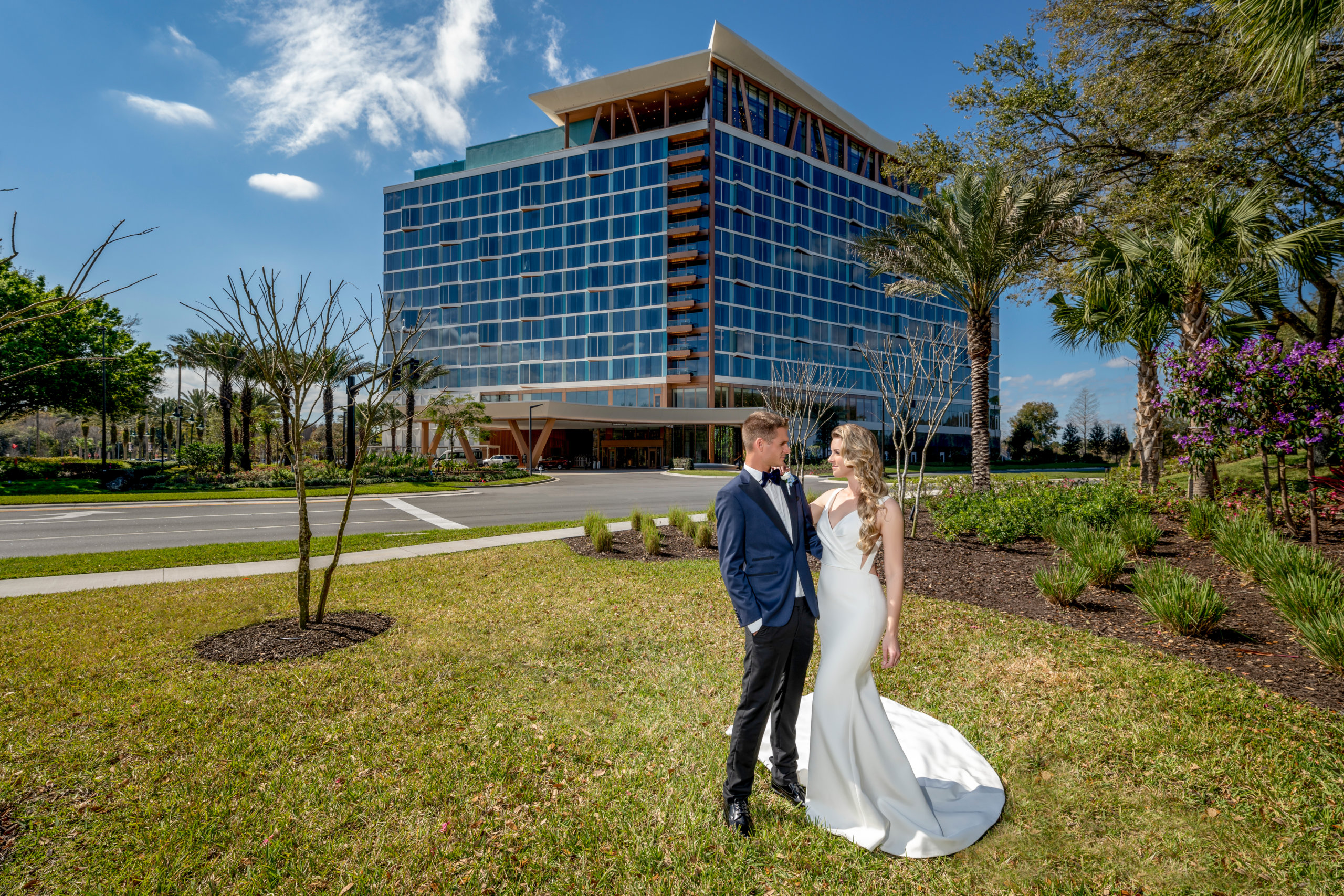 Wedding Couple Posing in Front of the Walt Disney World Swan Reserve