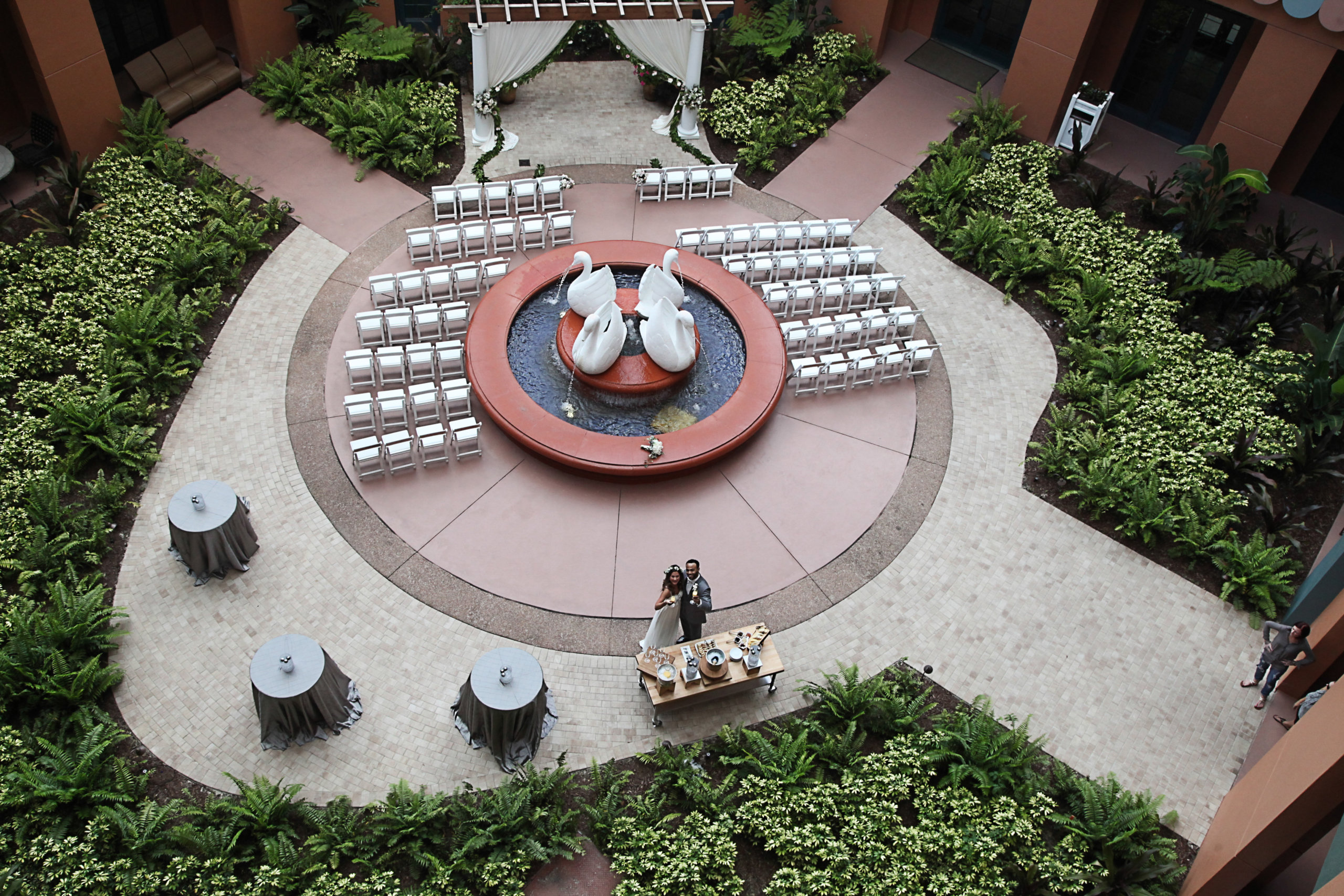 Aerial View of Courtyard Ceremony Set-Up with Wedding Couple at the Walt Disney World Swan Resort