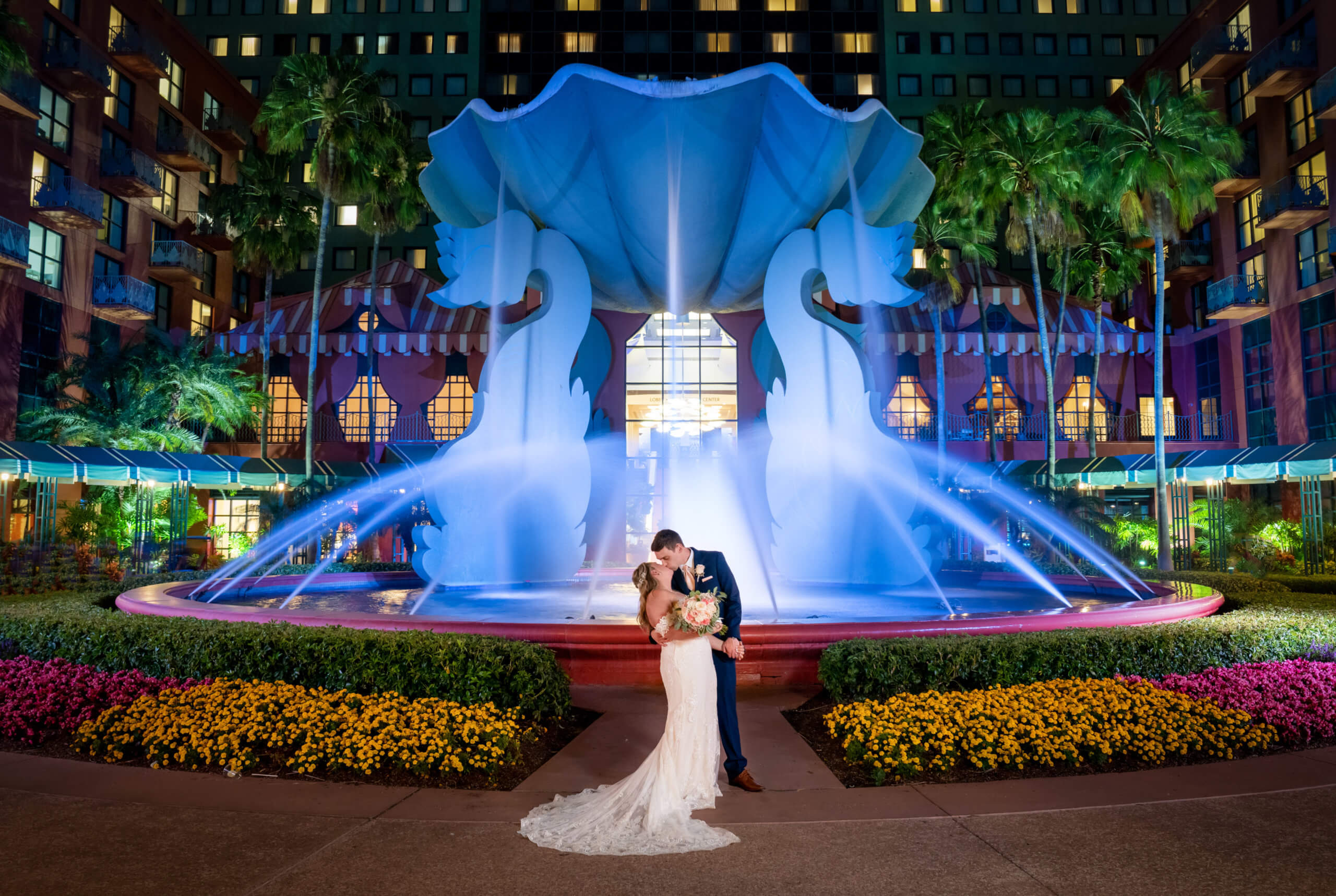 Wedding Couple in Front of Illuminated Fountain at the Walt Disney World Dolphin Resort